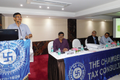 CA N. C Hegde addressing the delegates. Seen from L to R: CA Kirit Dedhia (Vice- Chairman), CA Anish Thacker (Vice-President) and CA Ronak Doshi (Convenor)
