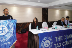 CA Shabbir Motorwala addressing the delegates. Seen from L to R: CA Isha Shekri (Convenor), CA Anish Thacker (Vice- President) and CA Ujwal Thakrar (Member)