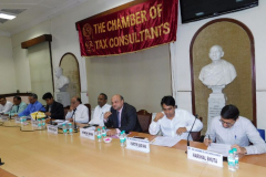 CA Hinesh Doshi giving his opening remarks. Seen from L to R: CA Rajesh L. Shah (Co-Chairman), Shri Kamlesh Sharma, Deputy General Manager, RBI (Panellist), CA Rajesh P. Shah (Chairman), CA Dilip Thacker (Moderator) Shri Himanshu Mohanty ex-GM, RBI (Speaker), CA Kartik Badiani (Vice-Chairman) and CA Harshal Bhuta (Convenor)