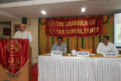 CA Hinesh Doshi (President) giving his opening remarks. Seen from L to R: CA Sachin Maher (Convenor) and CA Rakesh Vora (Speaker)