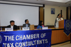 Ms. Varsha Galvankar (Chairperson), welcoming the participants. Seen from L to R: Mr. Parag Thakkar, I/C Principal, H. R. College, CA Vipul Choksi (President), Ms. Trisha Dutta, Professor, H. R. College
