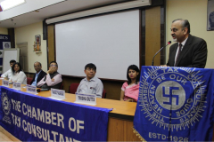 CA Kamlesh Vikamsey giving his comments to participants for the competition